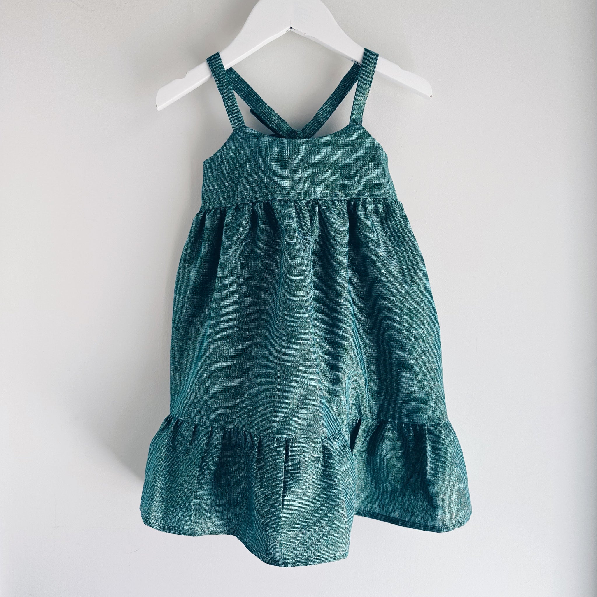 Bella Dress in shimmery green linen Naps Baby Designs Bella Dress in shimmery green linen Naps Baby Designs