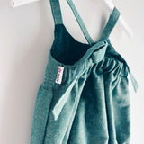 Bella Romper in shimmery green linen