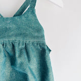 Bella Romper in shimmery green linen